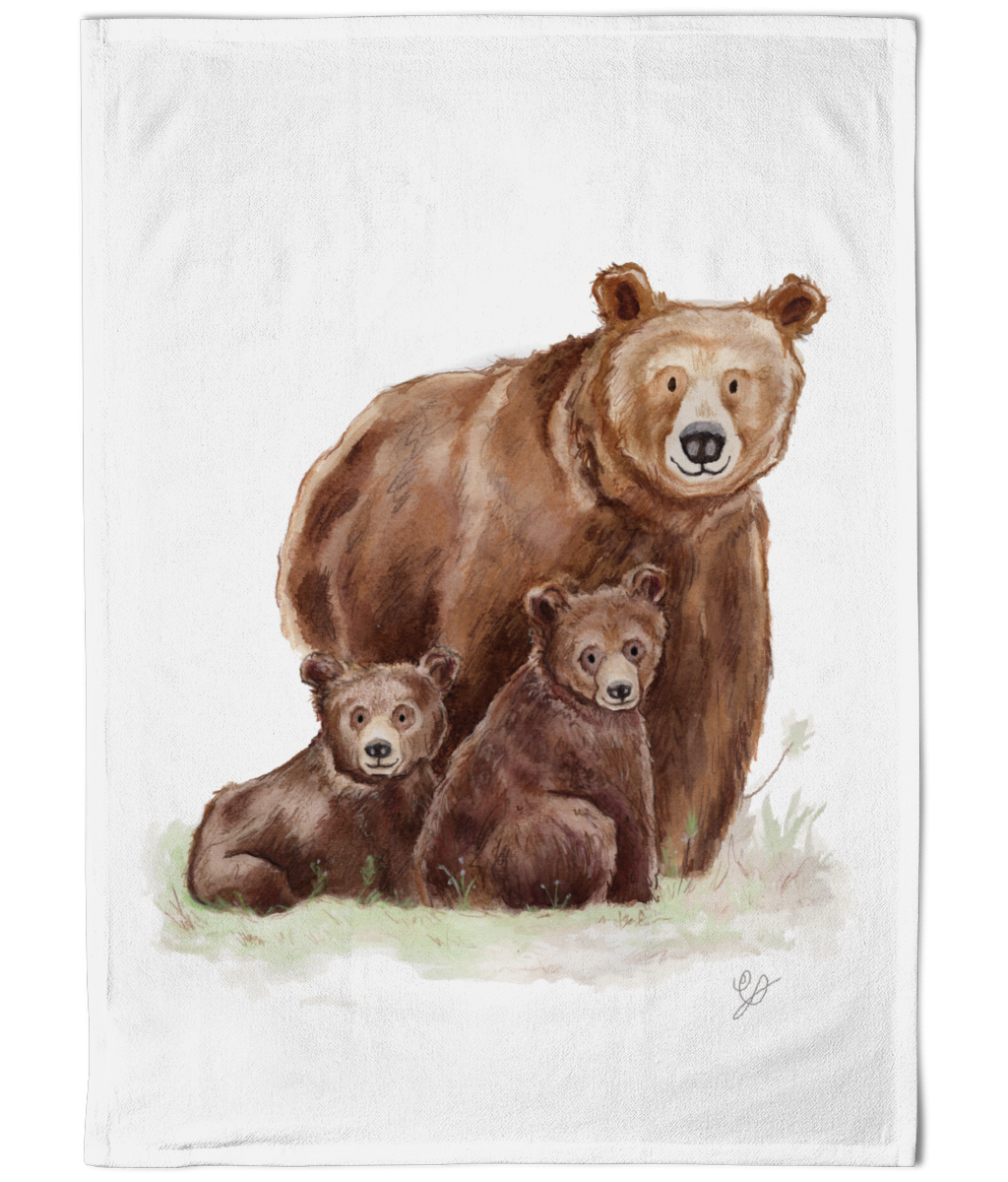 A cotton tea towel featuring a watercolour painting of three bears