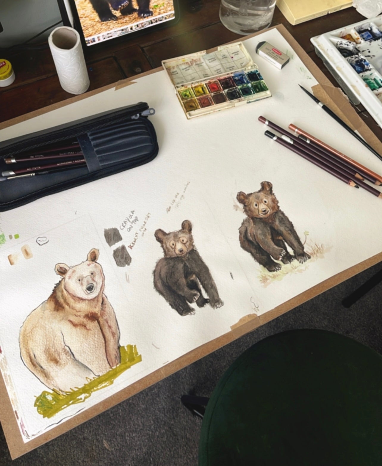 A photo from my art studio of bear watercolour paintings being created 