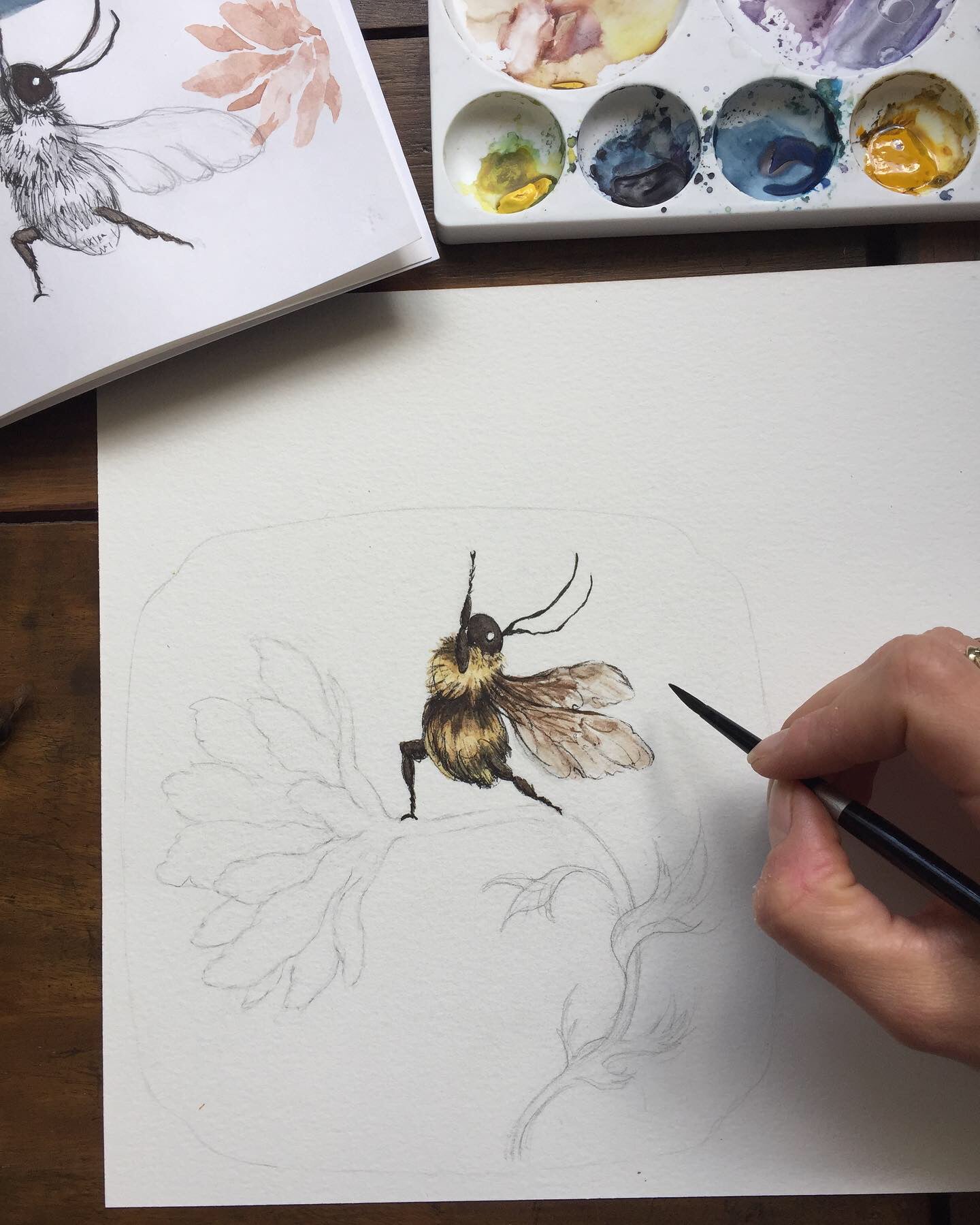 process photography of me painting the original watercolour yoga bee